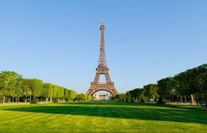 A wrought iron lattice tower on the Champ de Mars in Paris, France.